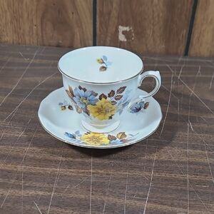 Royal Vale Tea Cup and Saucer Yellow & Blue Flower #8328 Bone China Gold Trim